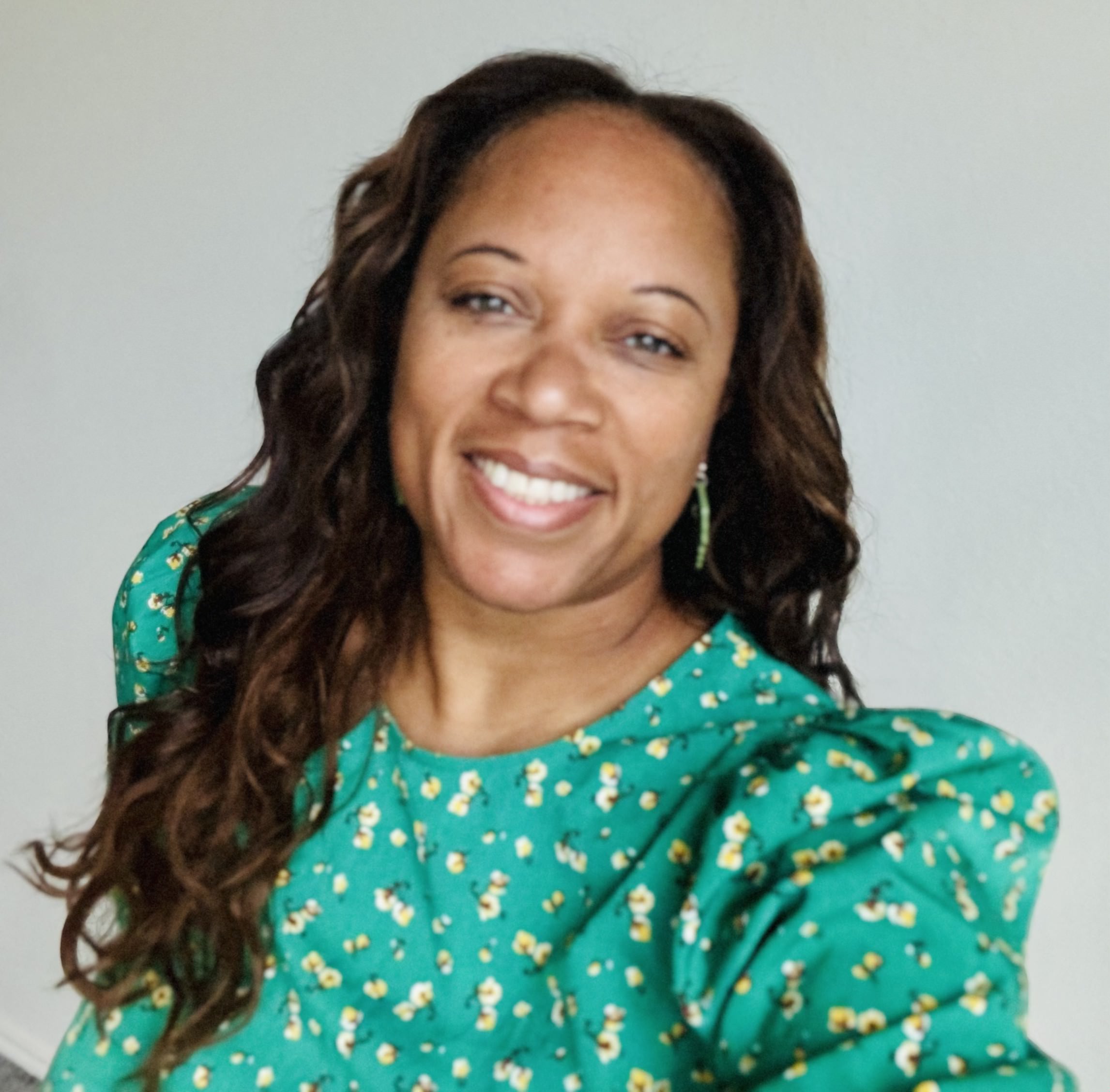 Portrait of Tia-Nikki Ivanko, founder of Access in Practice.